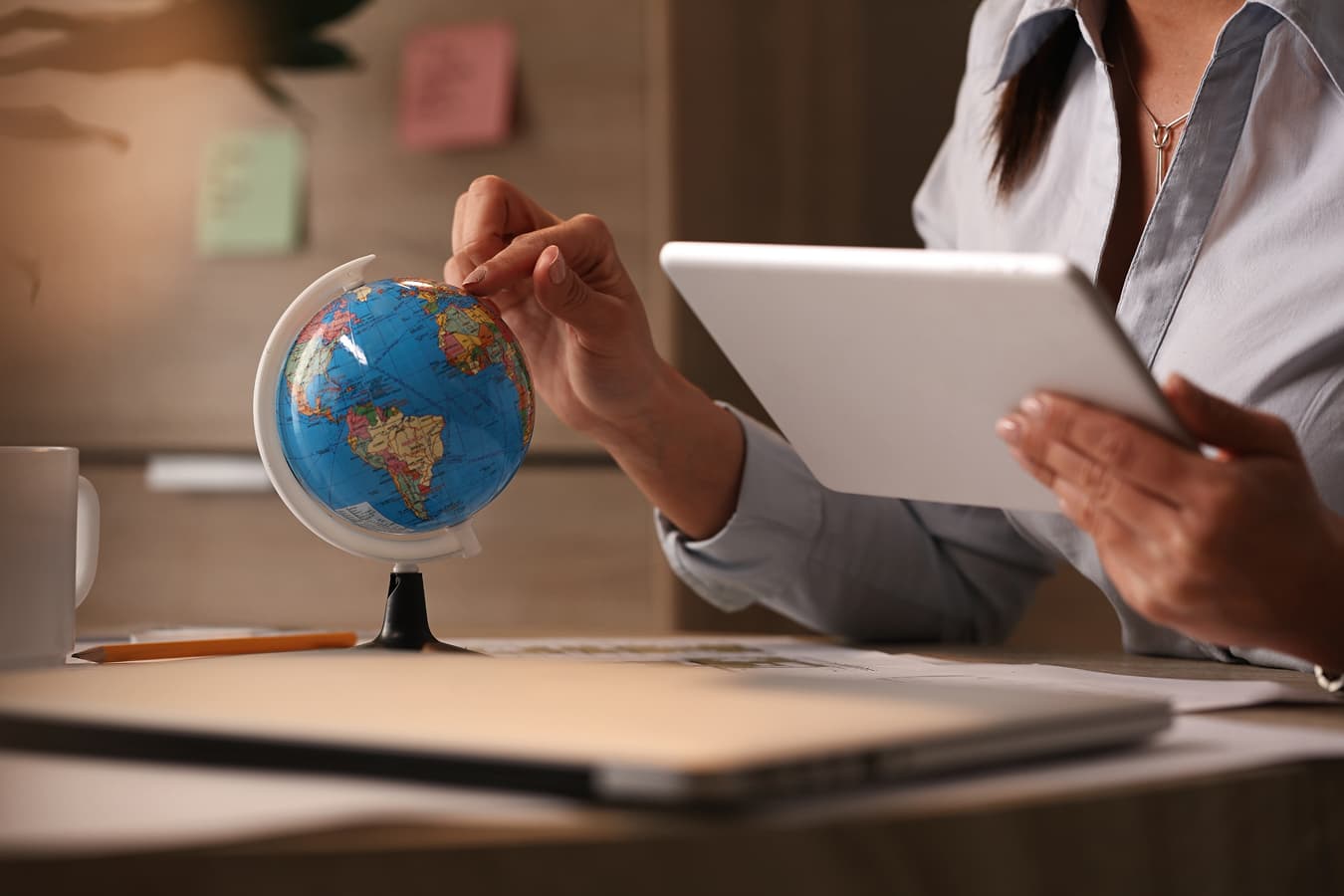 Unrecognizable Businesswoman Examining Globe While Surfing the N 1